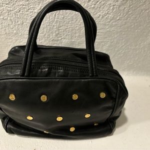 Vintage Loewe metallic studs bag selling as it